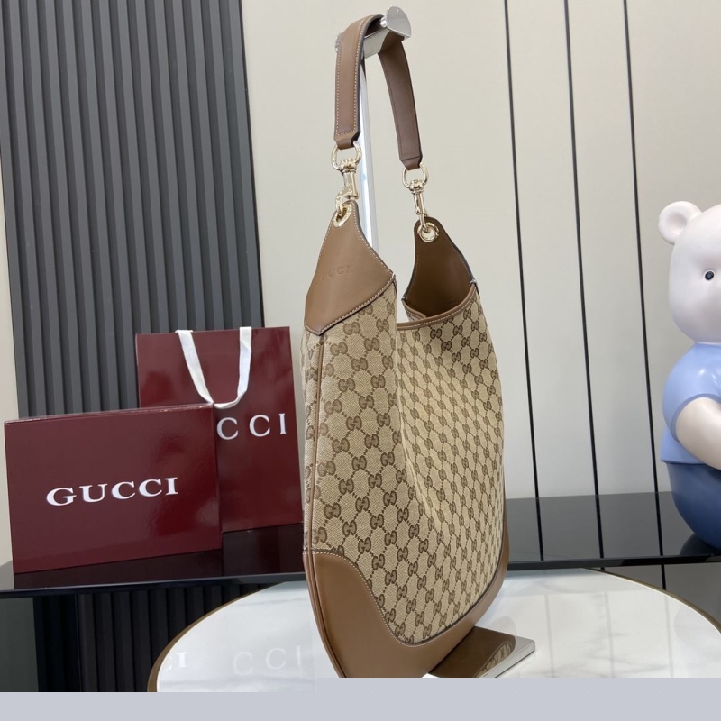 G*u*i top handle bags